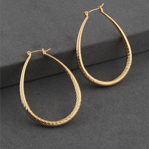 Burgu Model Altın Renk Çelik Halka Küpe