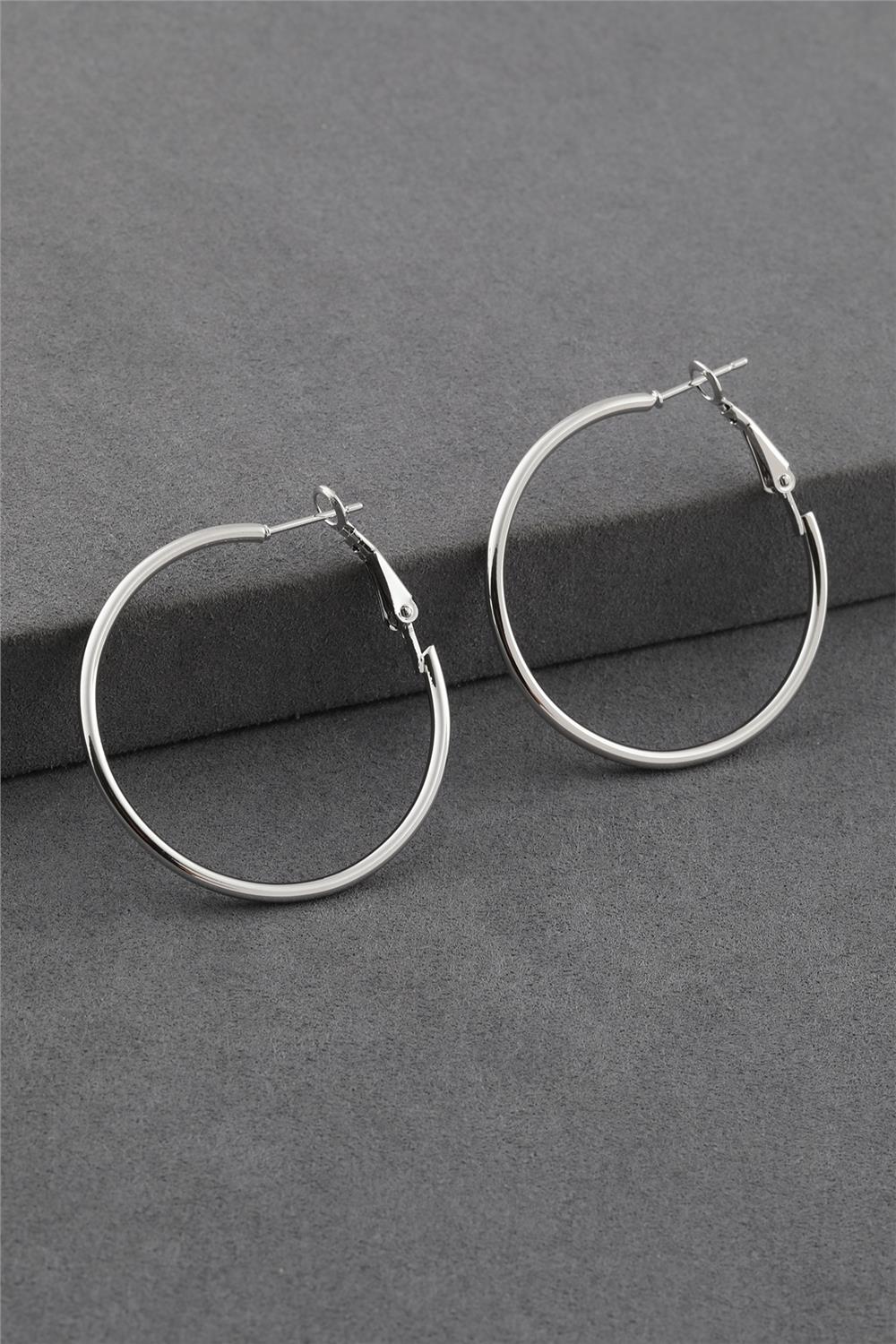 62834-Uploads-Urunresimleri-Buyuk-Celik-Kupe-4F5D-B-Jpg.jpg Düz Halka Gümüş Renkli Çelik Kilitli Küpe - Görsel 1