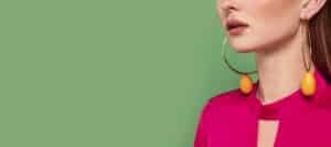 Beautiful Redhead Woman Wearing Fruit Earrings